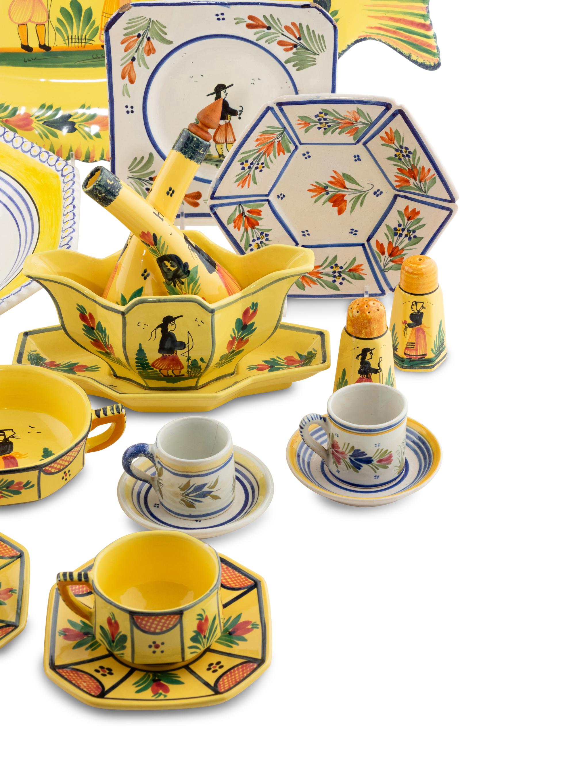 An Assembled Set of French Quimper Dinnerware