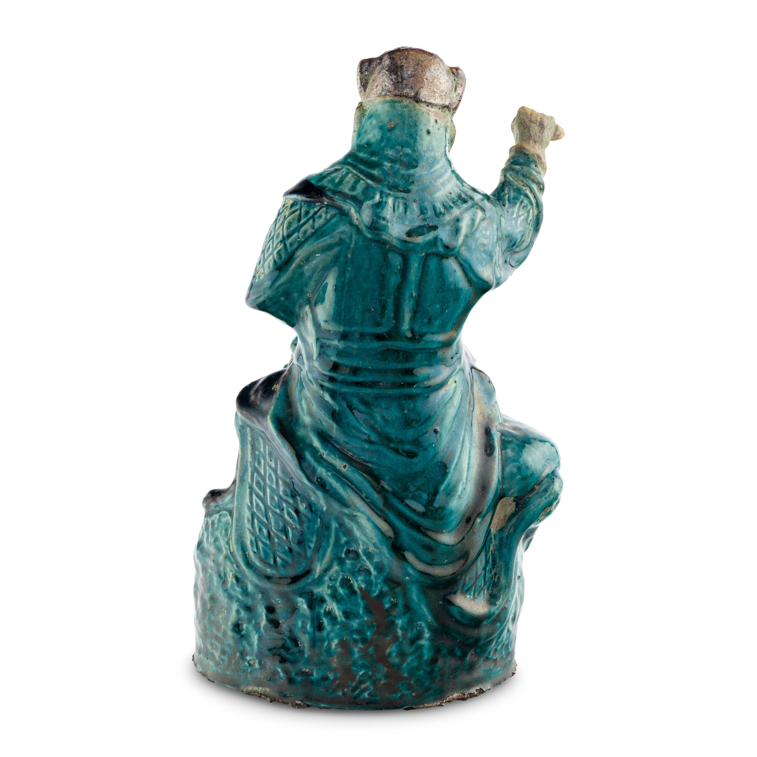 A Chinese Glazed Earthenware Figure