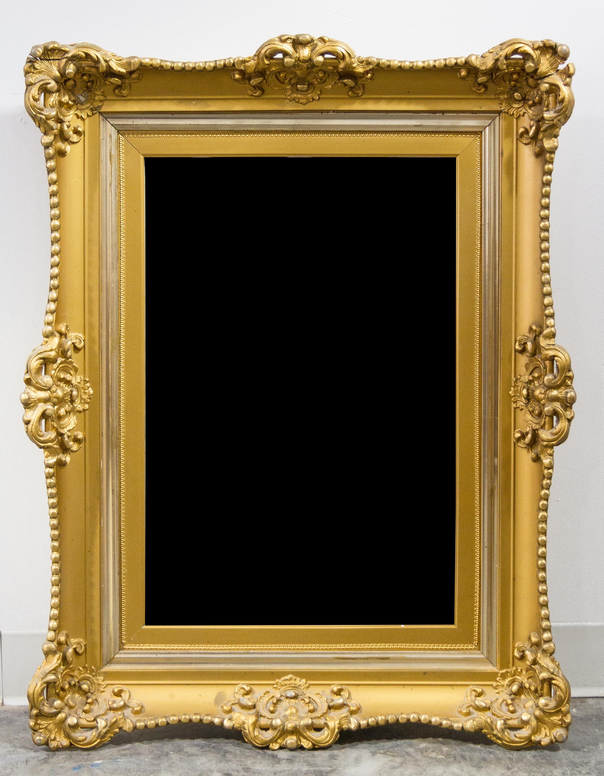 A Victorian Style Giltwood Mirror Height 35 x width 27 inches. — 20TH CENTURY
