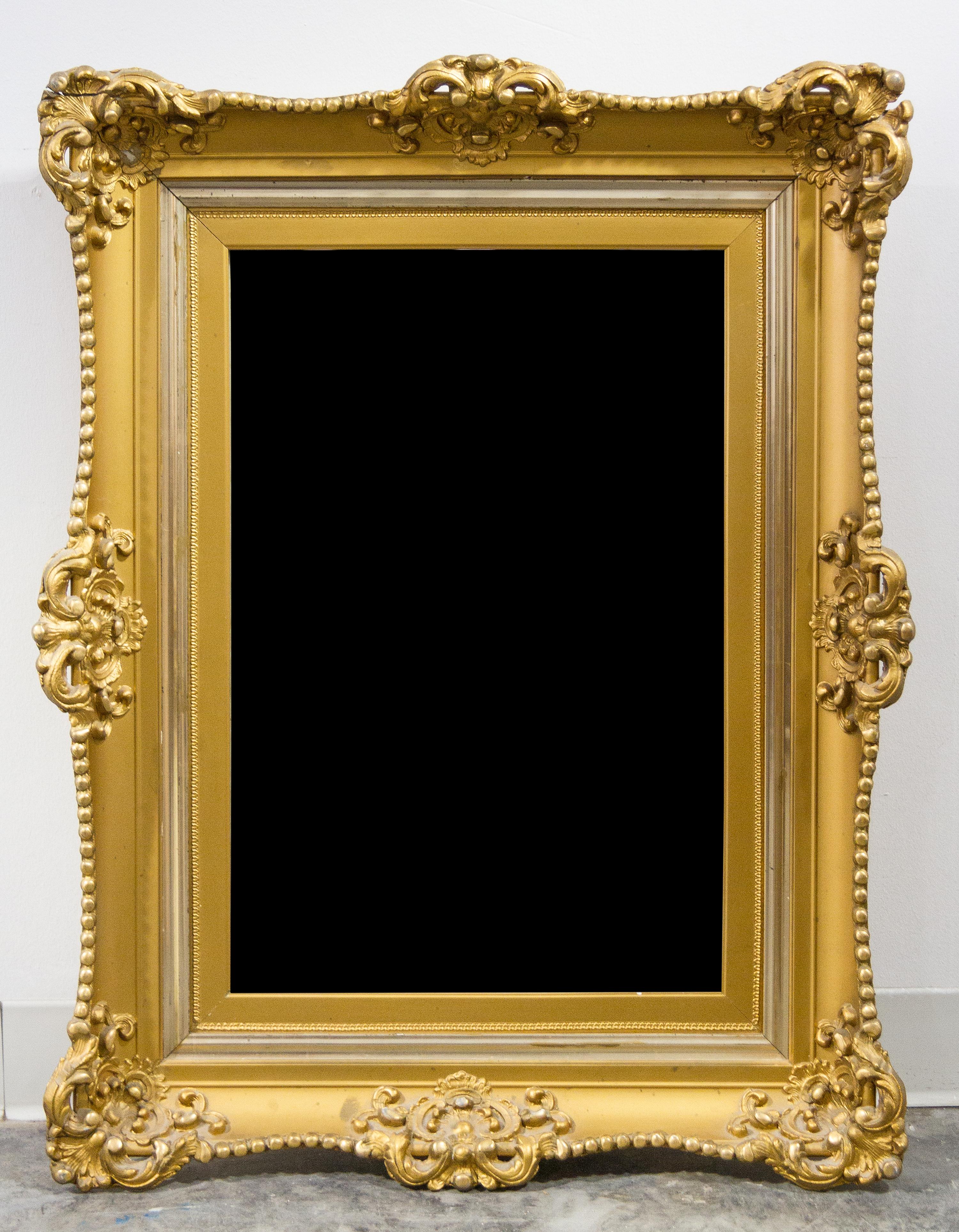 A Victorian Style Giltwood Mirror Height 35 x width 27 inches. — 20TH CENTURY