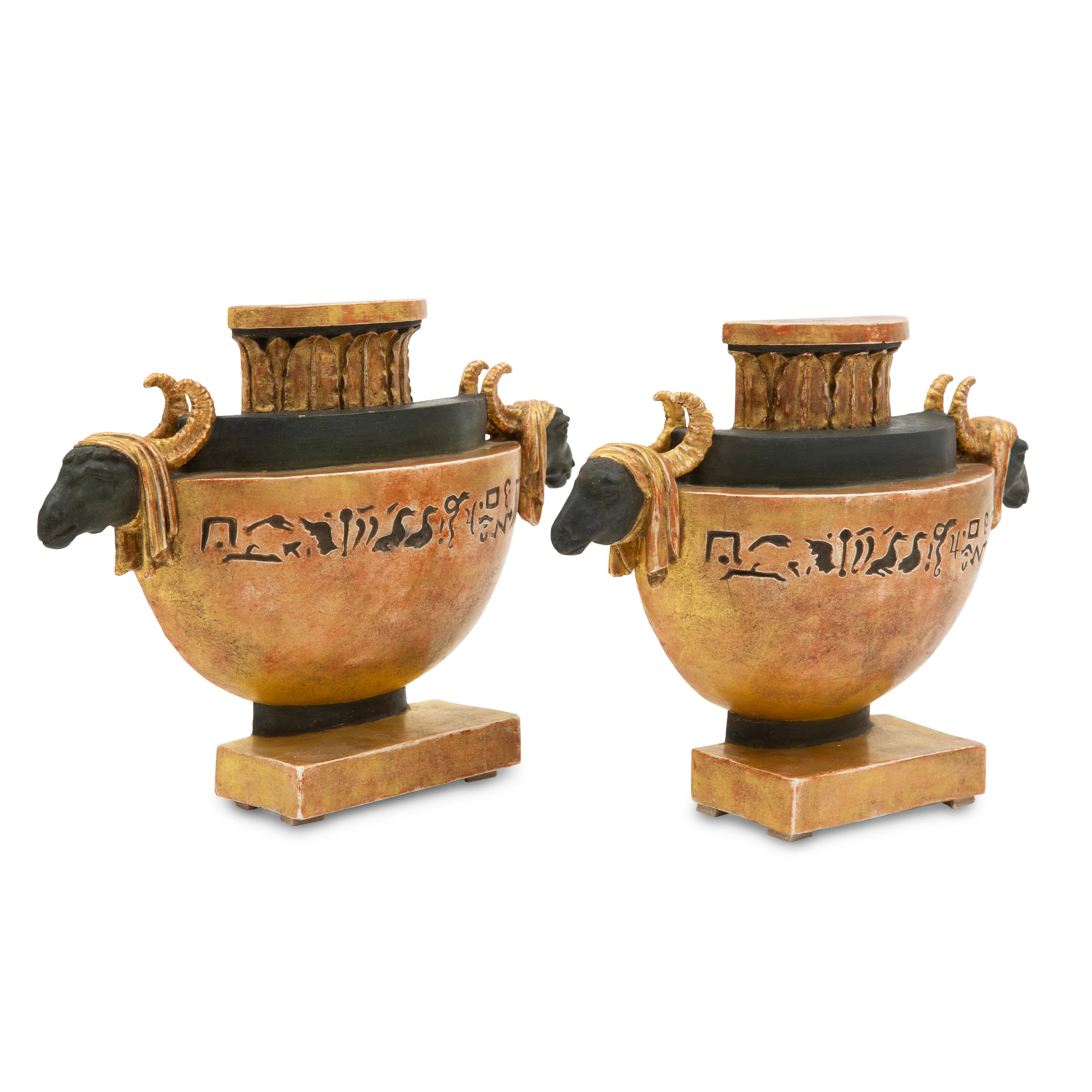 A Pair of Neoclassical Painted and Parcel Gilt Flat-Back Table Ornaments