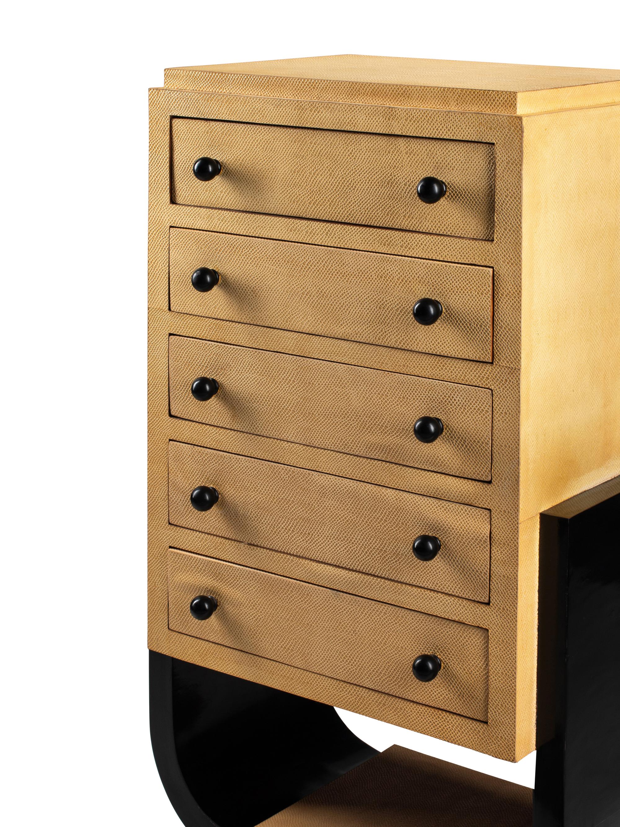 An Art Deco Style Parcel Ebonized Chest of Drawers