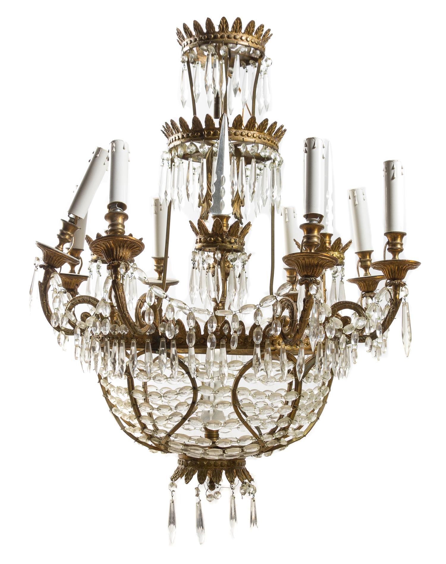 A Louis XVI Style Gilt Metal and Leaded Glass Eight-Light Chandelier Height 43 1/4 x diameter 25 inches. — EARLY 20TH CENTURY