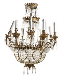 A Louis XVI Style Gilt Metal and Leaded Glass Eight-Light Chandelier Height 43 1/4 x diameter 25 inches. — EARLY 20TH CENTURY