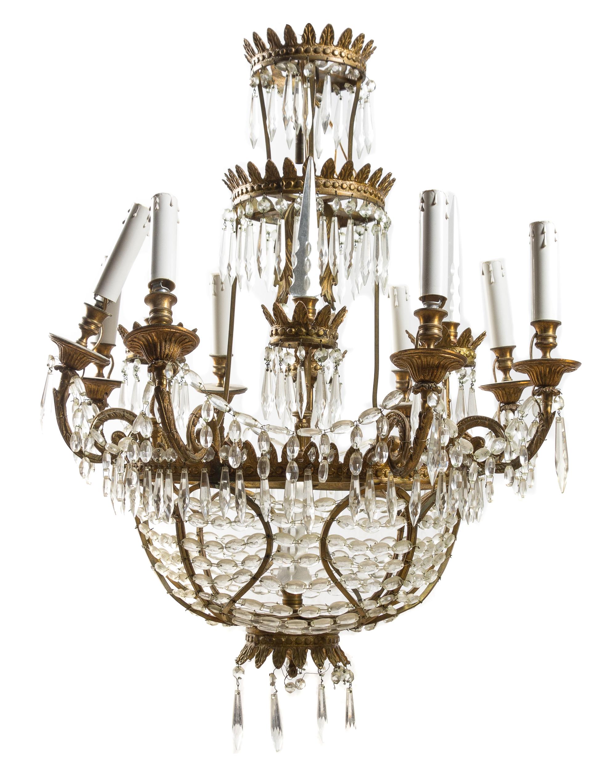 A Louis XVI Style Gilt Metal and Leaded Glass Eight-Light Chandelier Height 43 1/4 x diameter 25 inches. — EARLY 20TH CENTURY