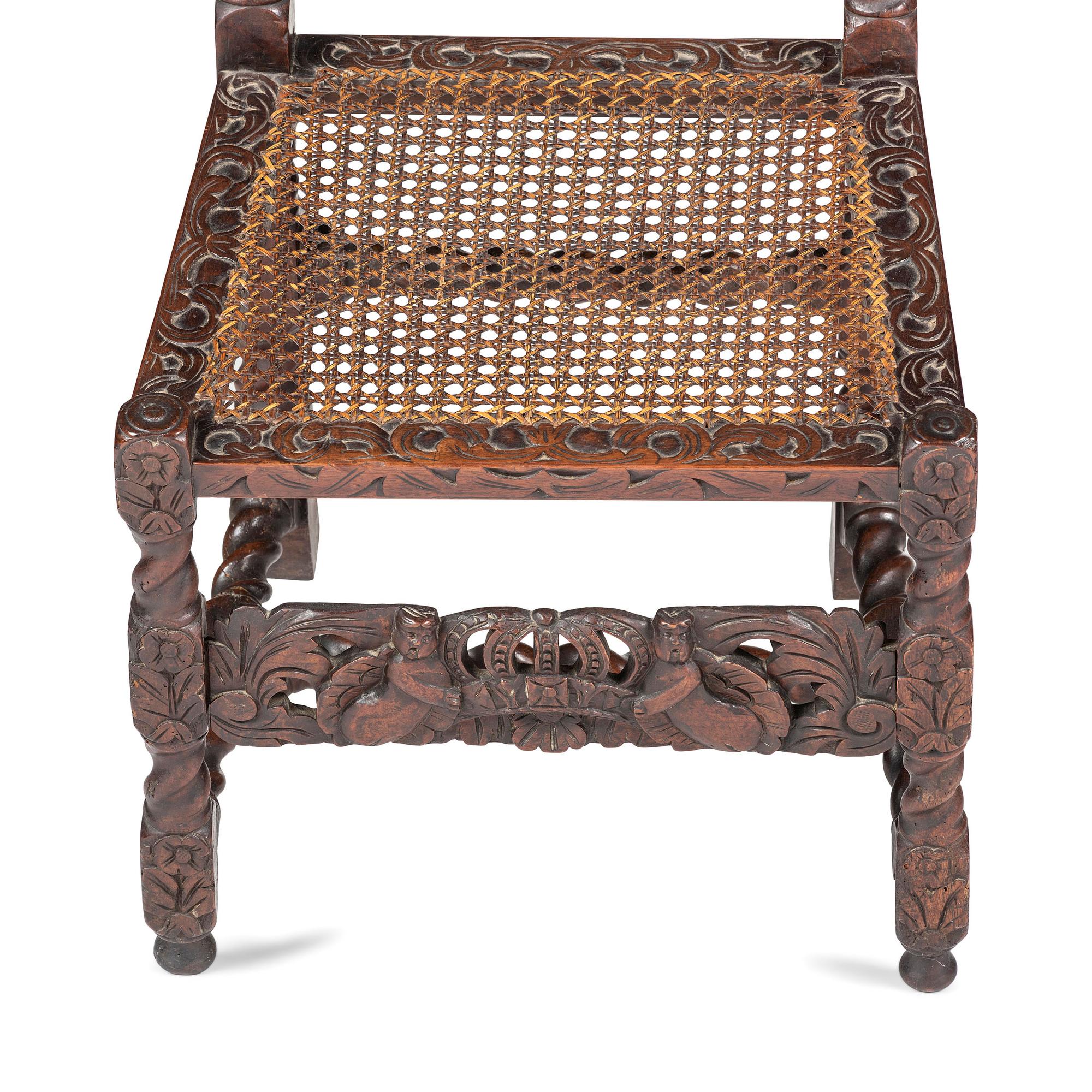 A William and Mary Crown-and-Flower Carved Oak and Cane Upholstered Side Chair