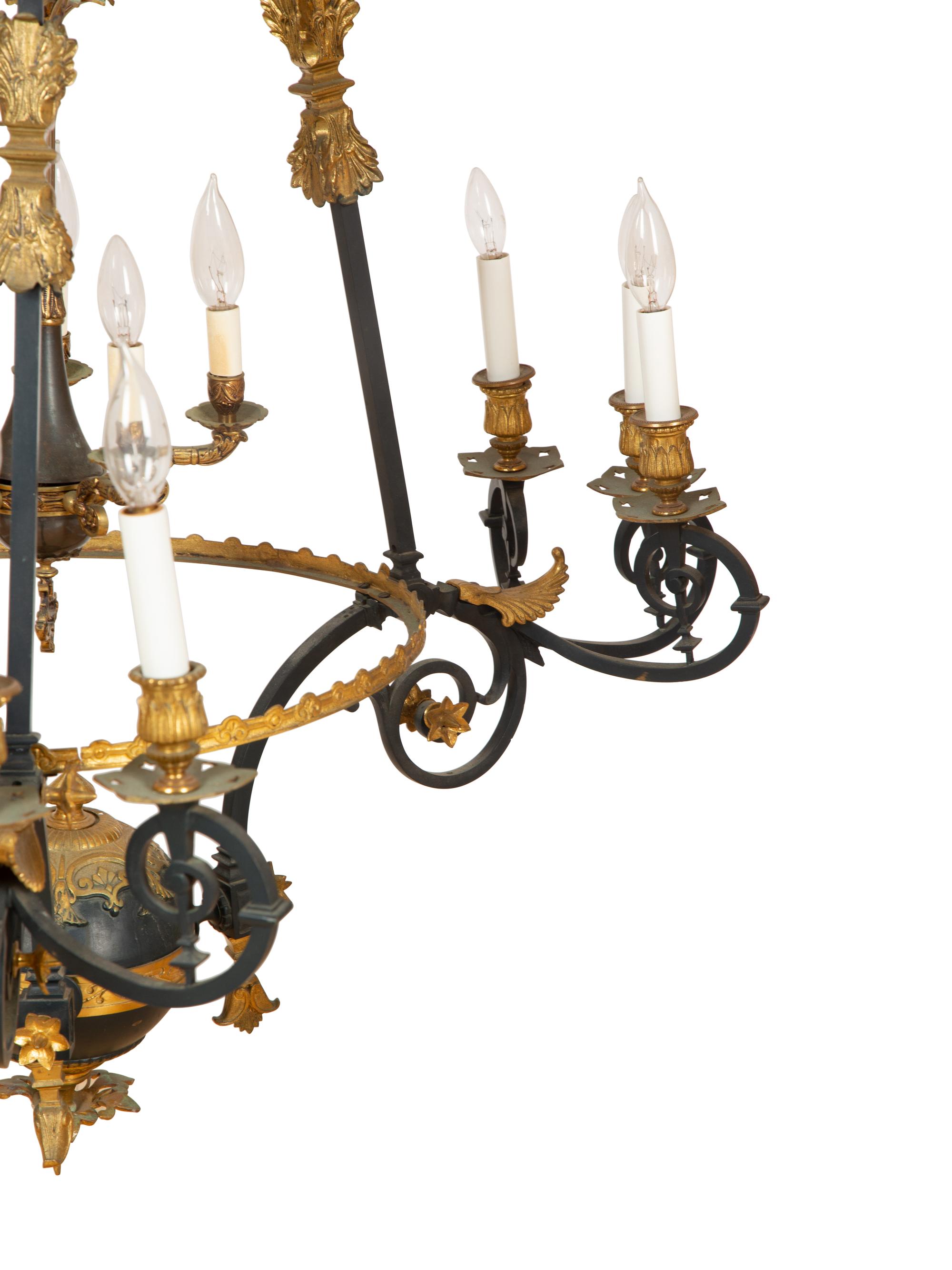 A French Empire Style Ebonized and Gilt Metal Fourteen-Light Chandelier