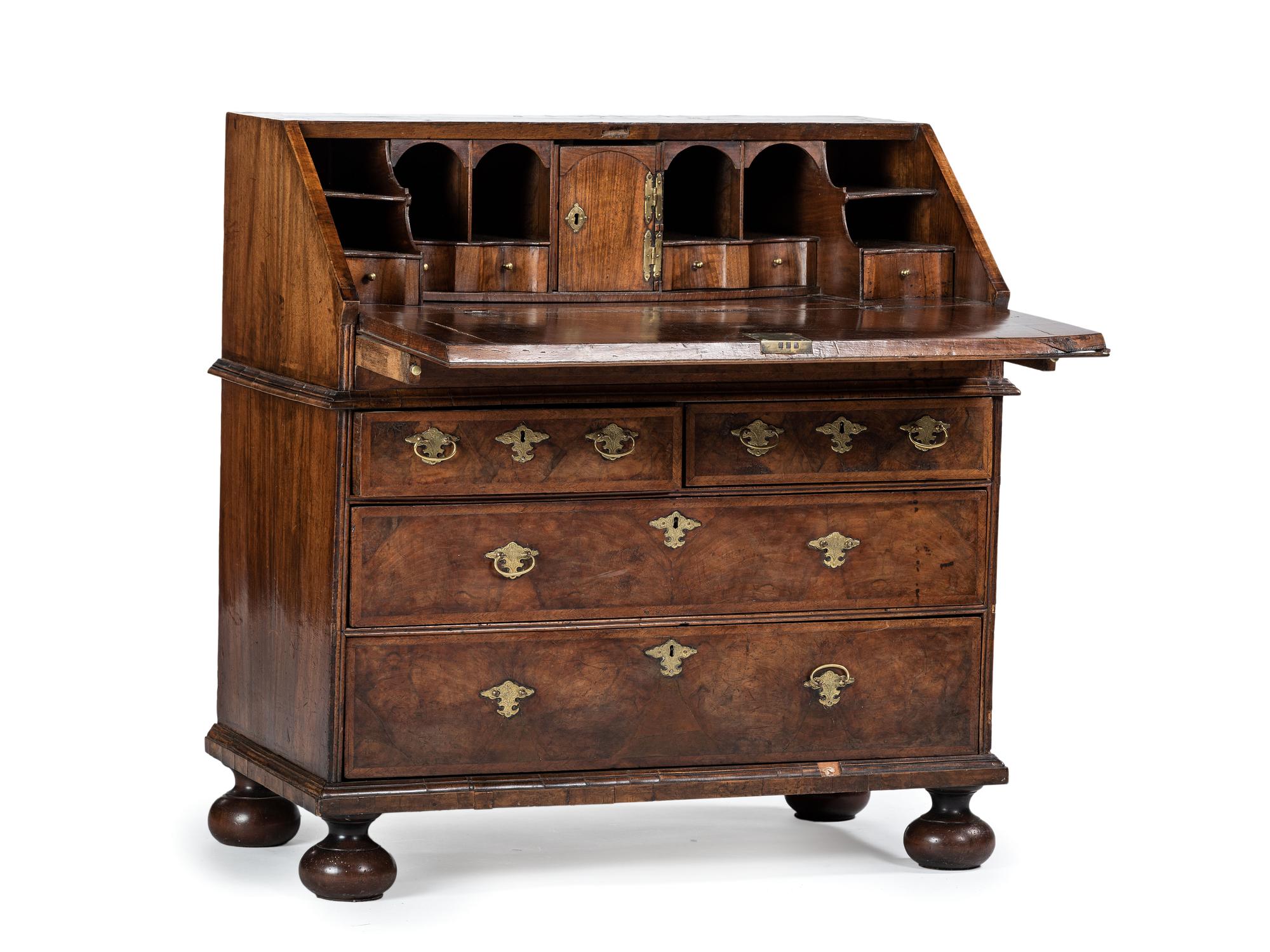 A William and Mary Style Figured Walnut Slant Front Desk