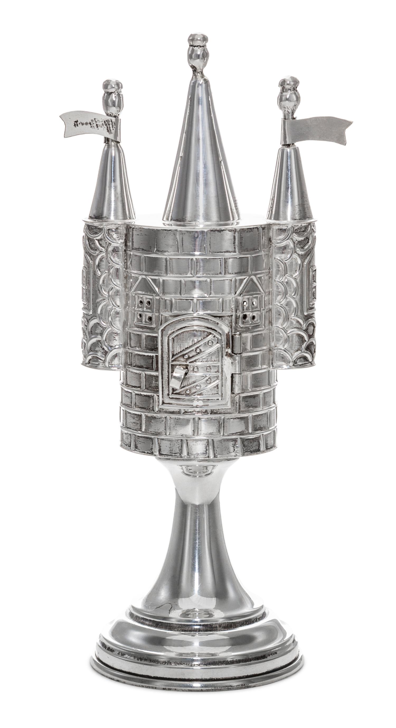 A Continental Silver Spice Tower, 20th Century, of castle form with three spires and raised on a trumpet base.