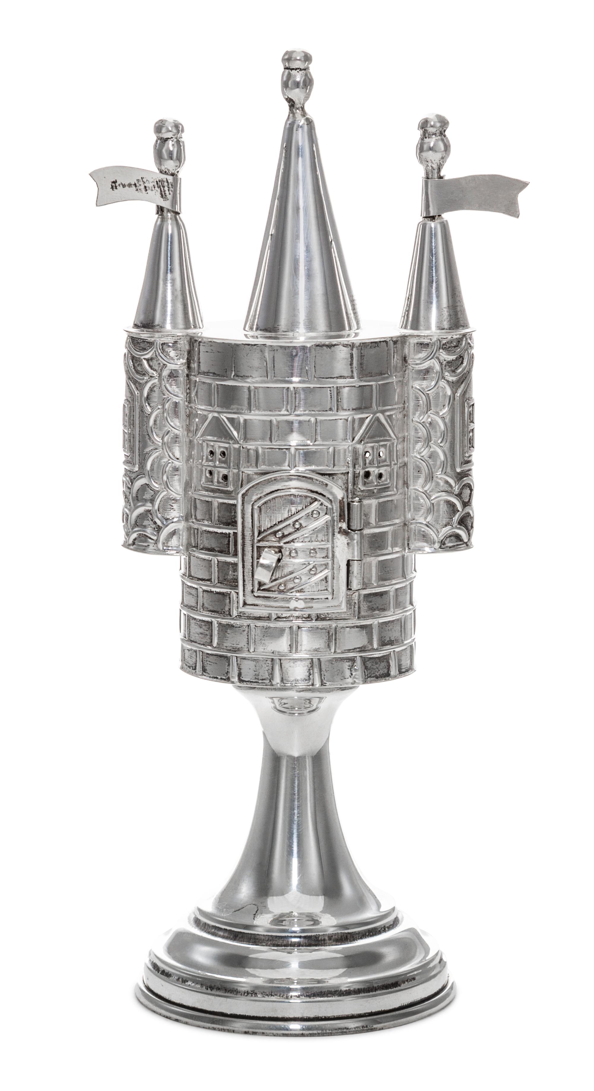 A Continental Silver Spice Tower, 20th Century, of castle form with three spires and raised on a trumpet base.