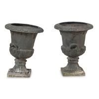 A Pair of Composition Garden Urns