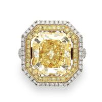 10.88 CARAT FANCY YELLOW DIAMOND AND DIAMOND RING