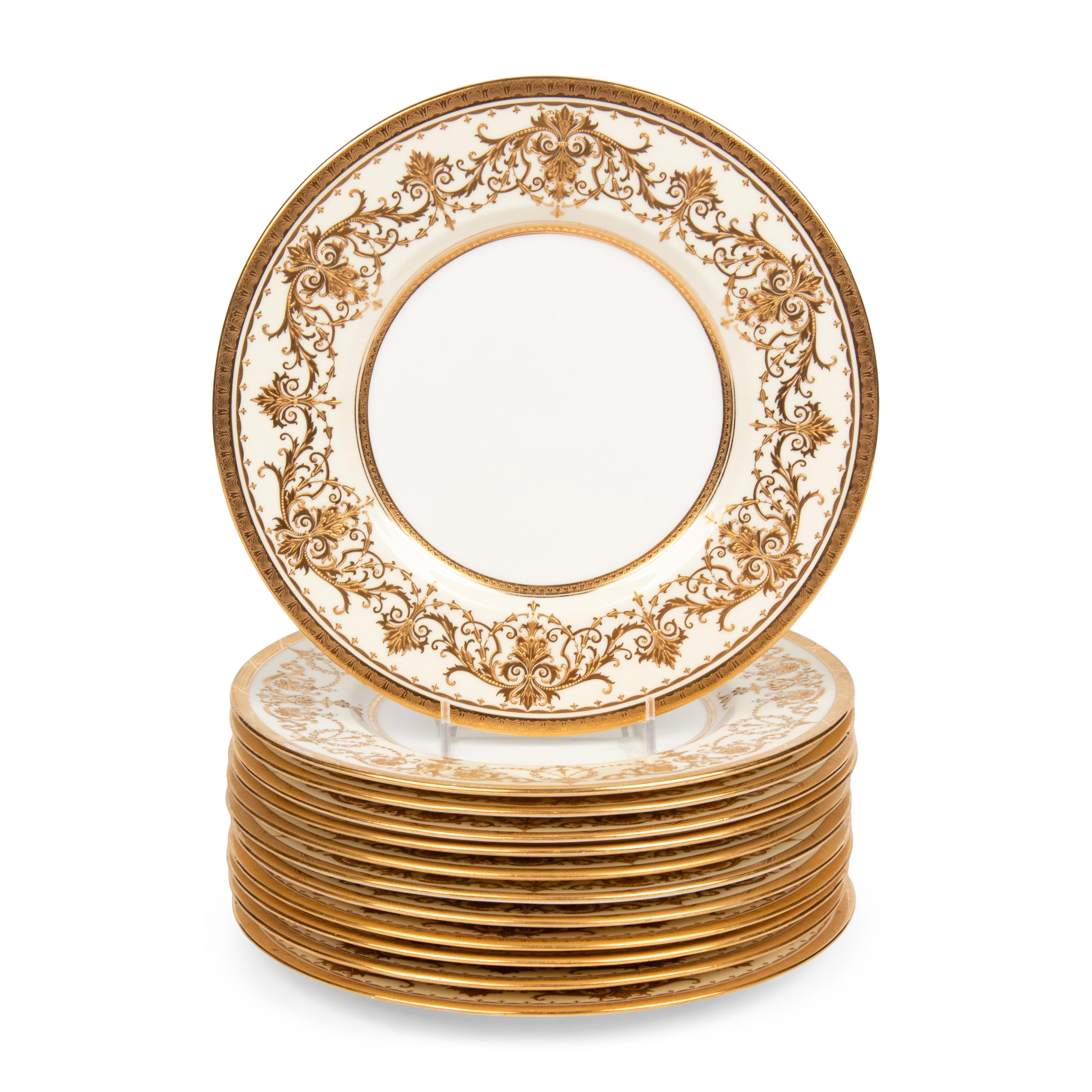 A Set of Twelve Minton Parcel-Gilt Porcelain Plates