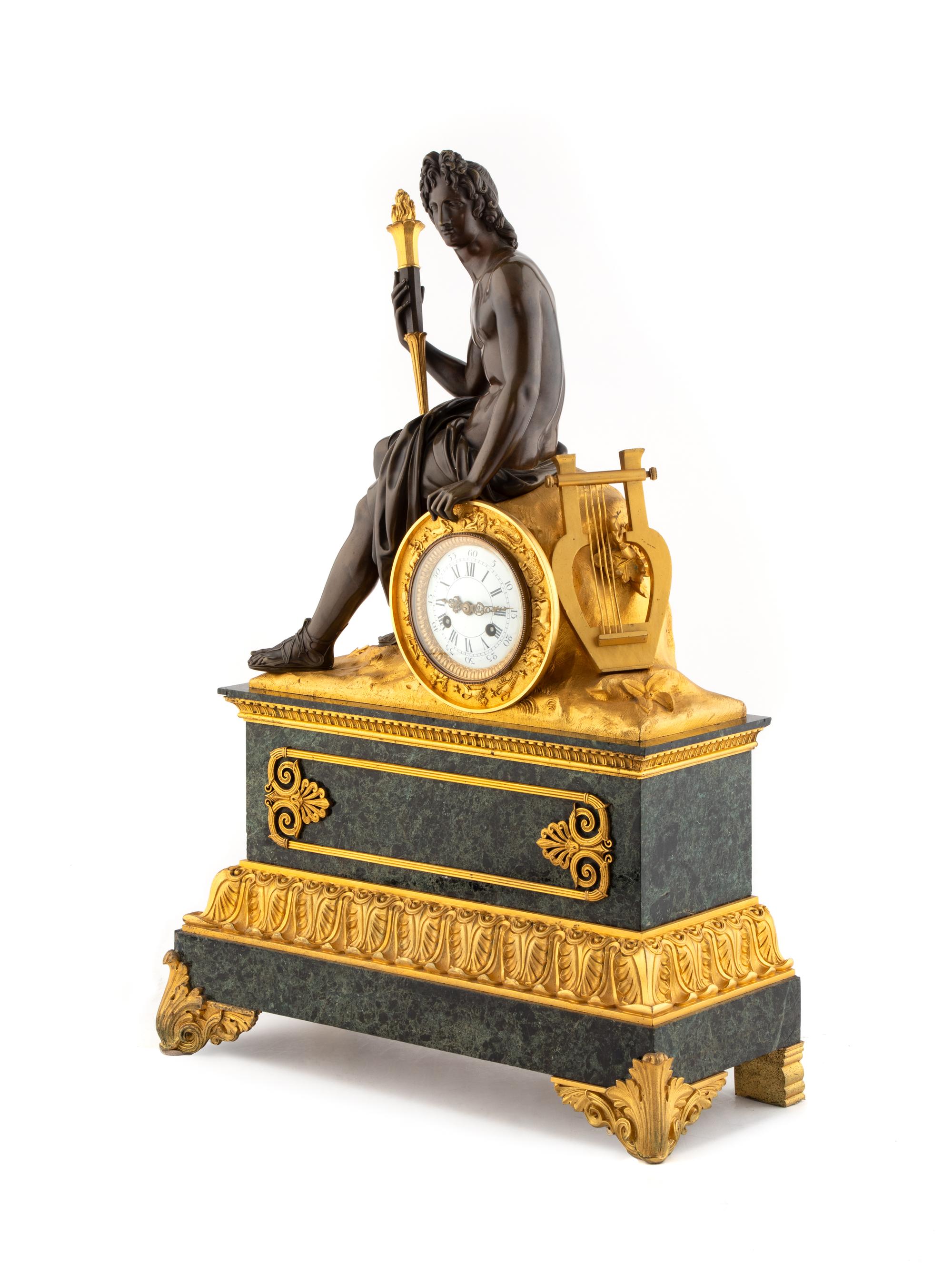 A Louis Philippe Gilt and Patinated Bronze and Marble Mantel Clock