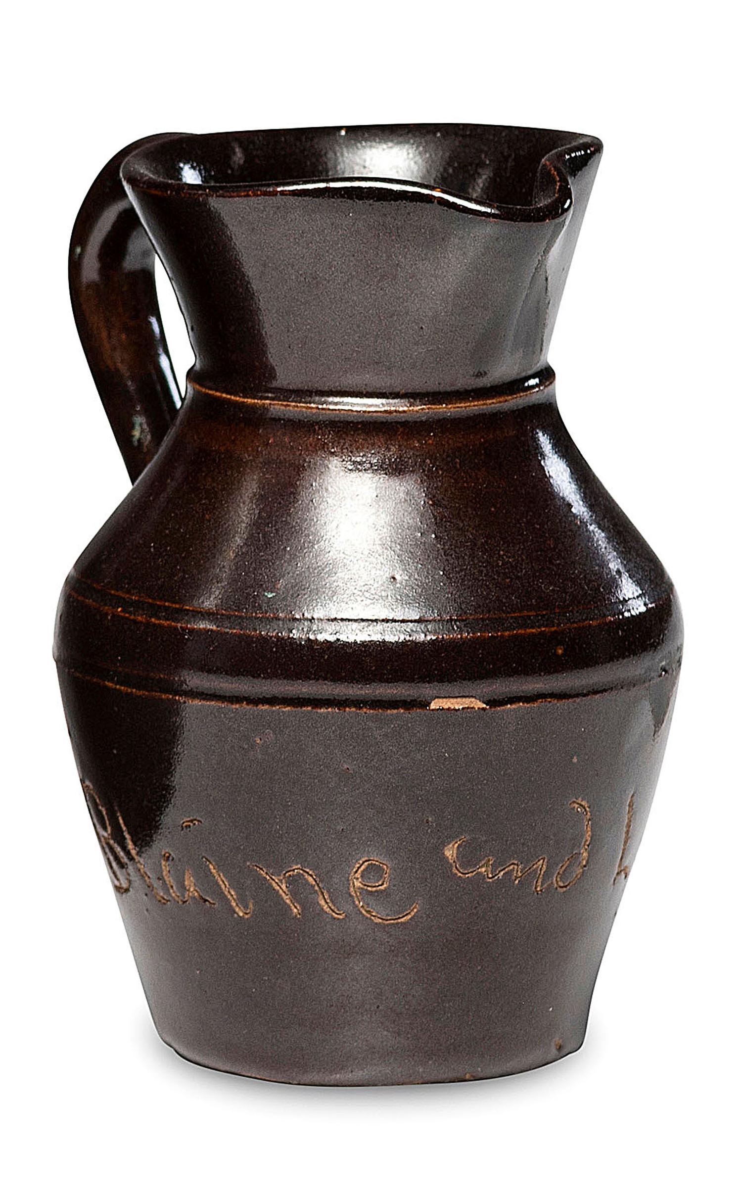 A Miniature Albany Slip-Glazed Political Campaign Favor Pitcher
