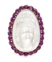 A Carved Moonstone Cameo and Amethyst Pendant/Brooch, 13.40 dwts.