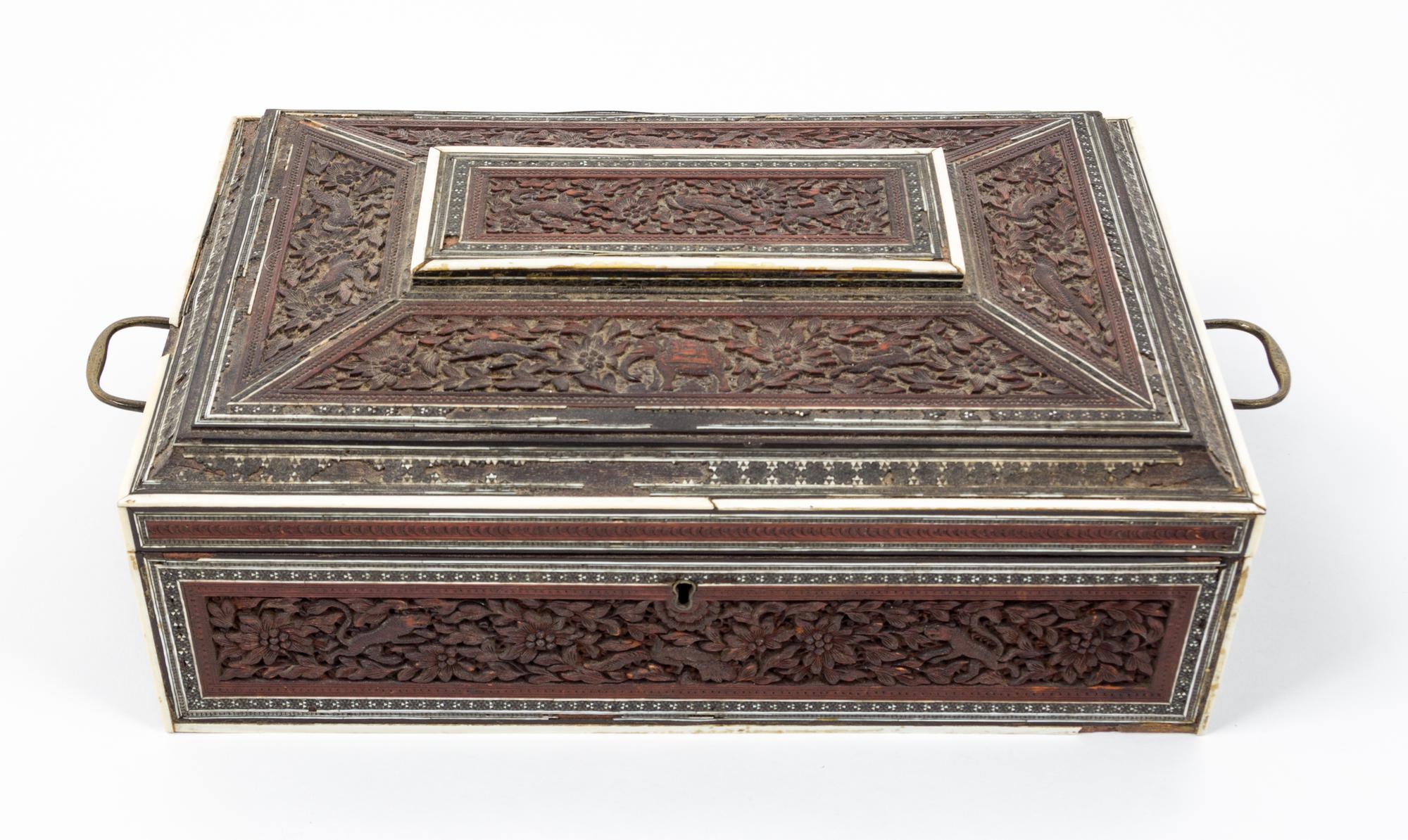 A Carved Wood Sewing Box Height 4 1/2 x width 12 7/8 x depth 9 1/4 inches.