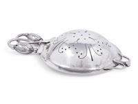 A Georg Jensen Silver Blossom Pattern Tea Strainer