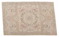 An Aubusson Style Needlepoint Rug 5 feet 8 inches x 3 feet 8 inches. — EARLY 20TH CENTURY