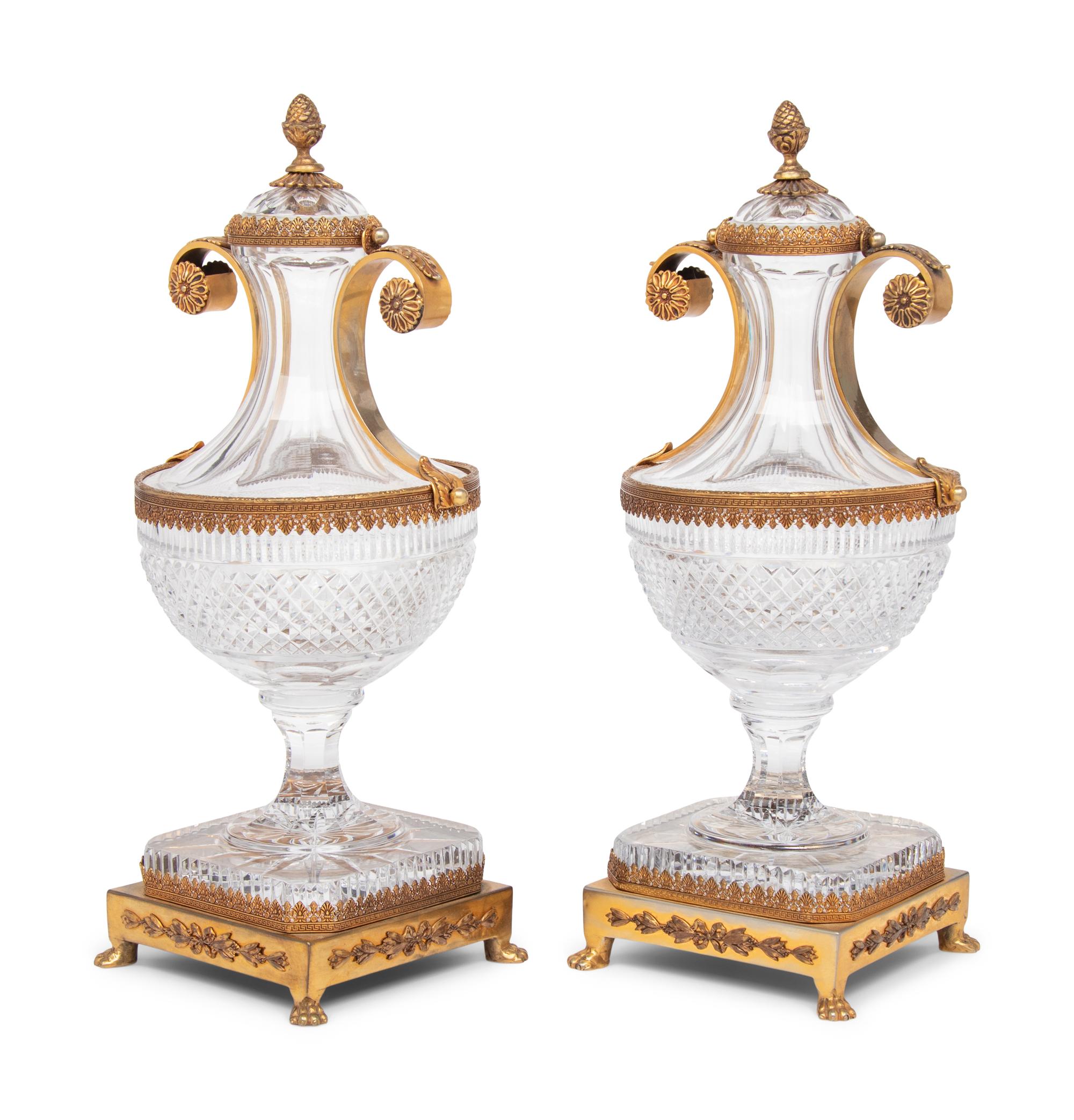 A Pair of Gilt Metal Mounted Cut Gass Urns