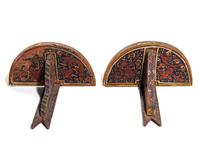 A Pair of Painted Wood Brackets