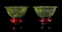 A Pair of Spinach Jade Bowls Diameter 3 5/8 inches.