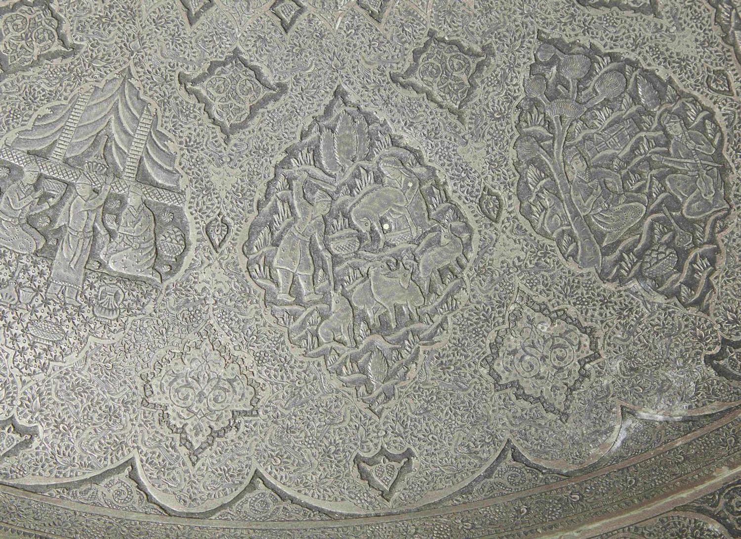 A large Persian hand-dotted silvered metal tray, probably Isfahan, circa 1900