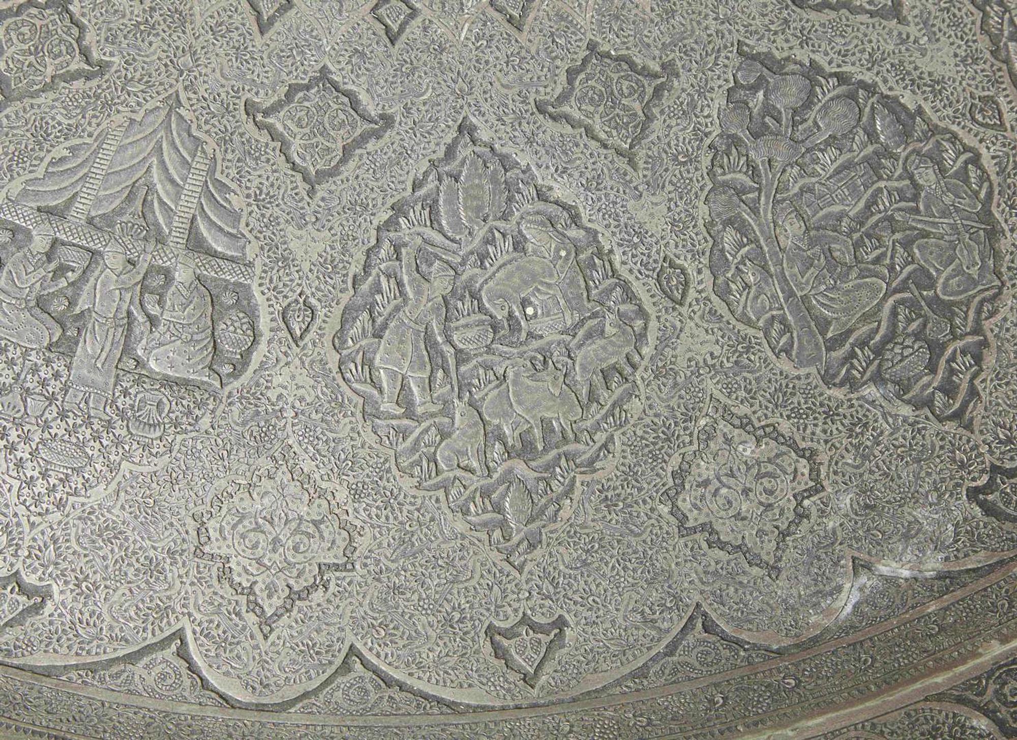 A large Persian hand-dotted silvered metal tray, probably Isfahan, circa 1900
