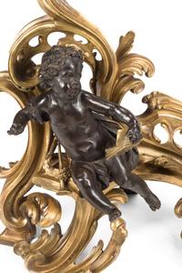 A Pair of Louis XV Style Gilt and Patinated Bronze Figural Chenets