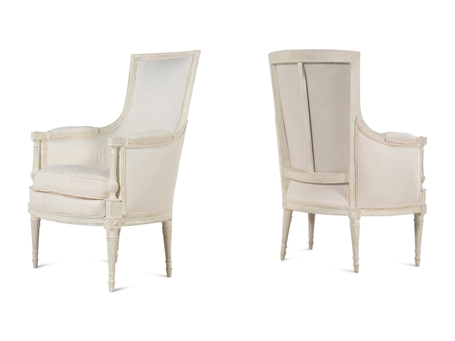 A Pair of Directoire Style White-Painted Bergères