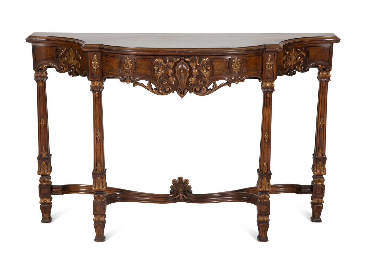 A Continental Carved and Parcel Gilt Console Table