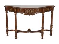 A Continental Carved and Parcel Gilt Console Table