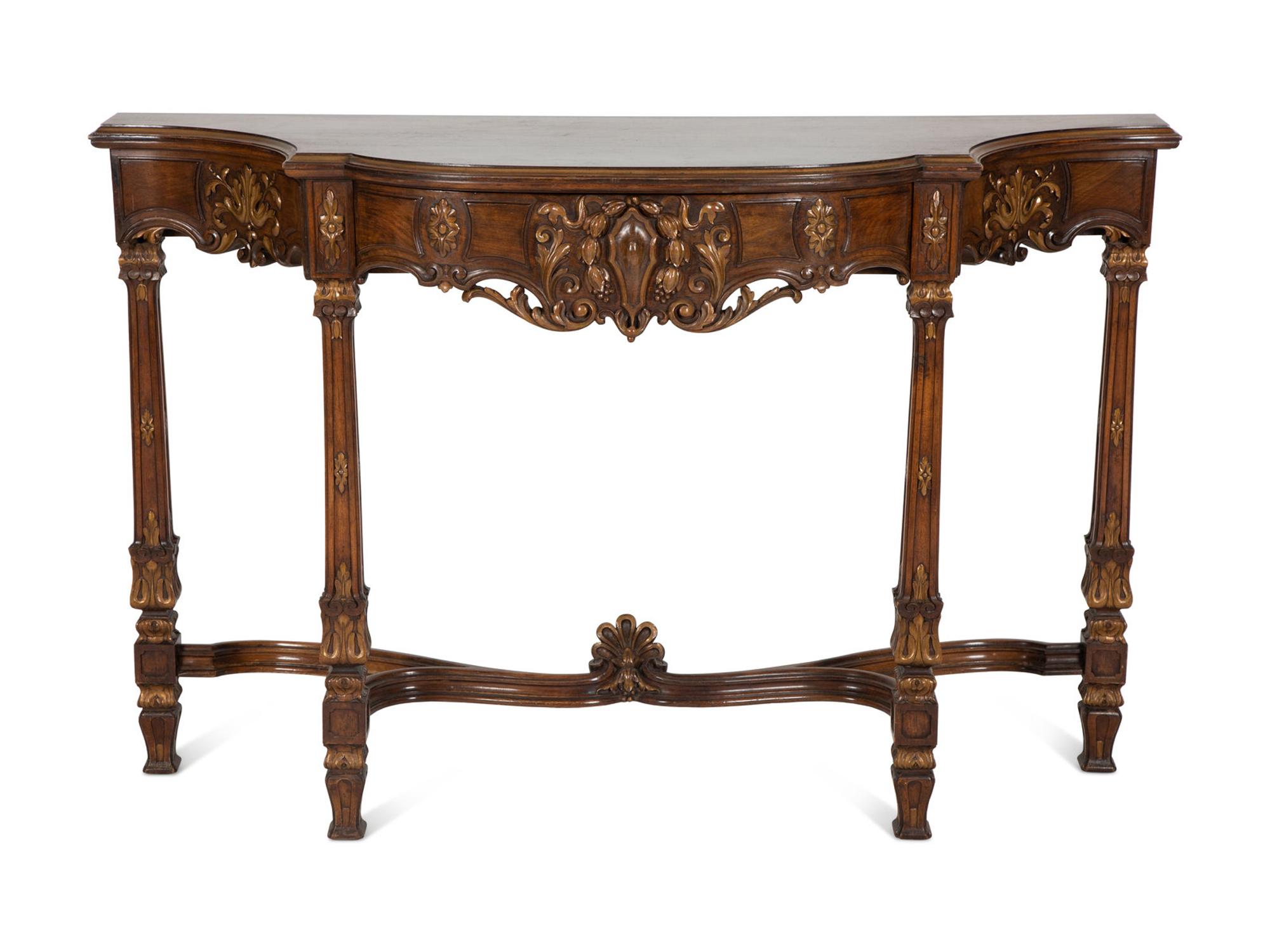 A Continental Carved and Parcel Gilt Console Table