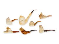 A Group of Seven Carved Meerschaum Pipes