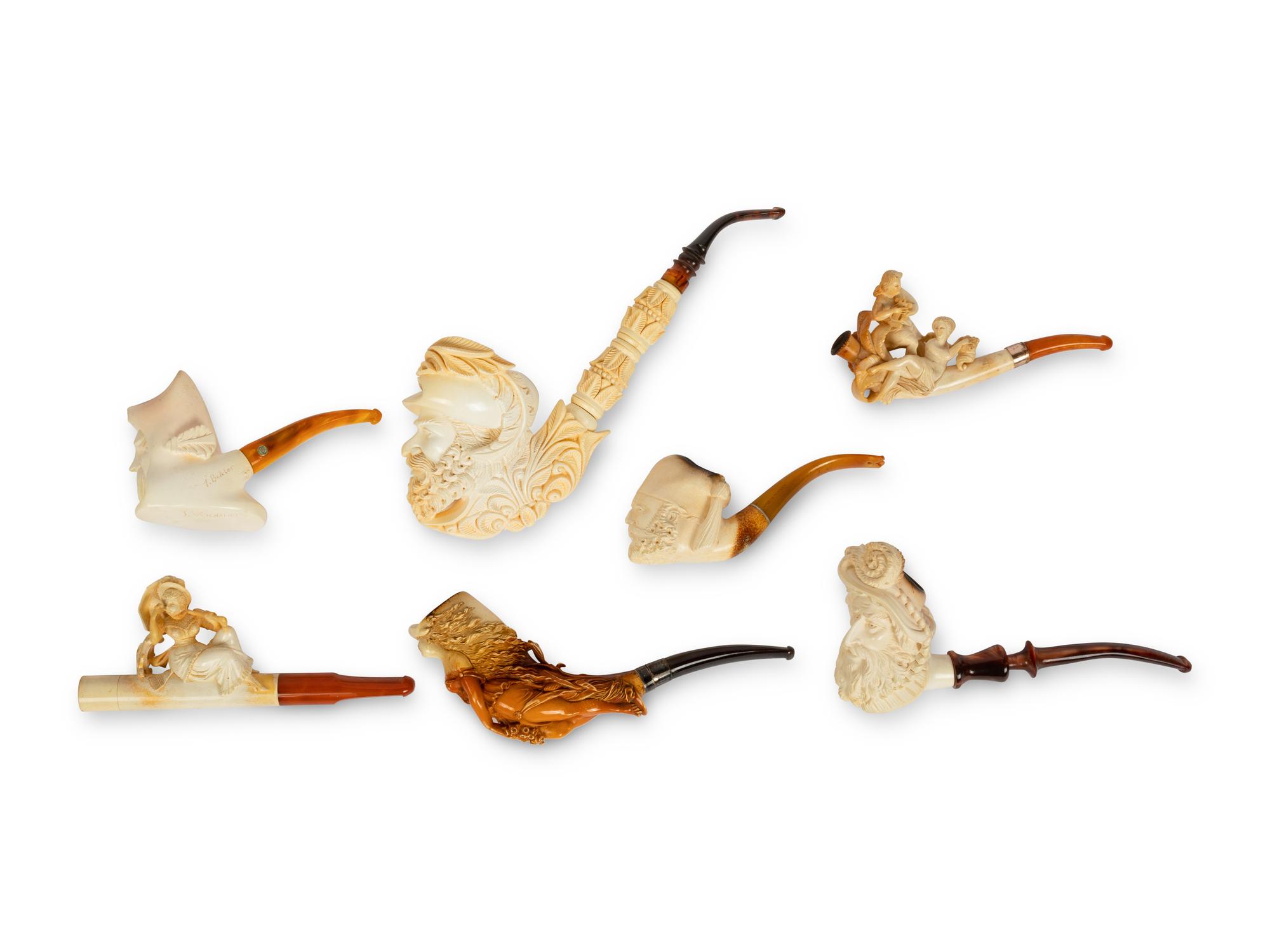 A Group of Seven Carved Meerschaum Pipes