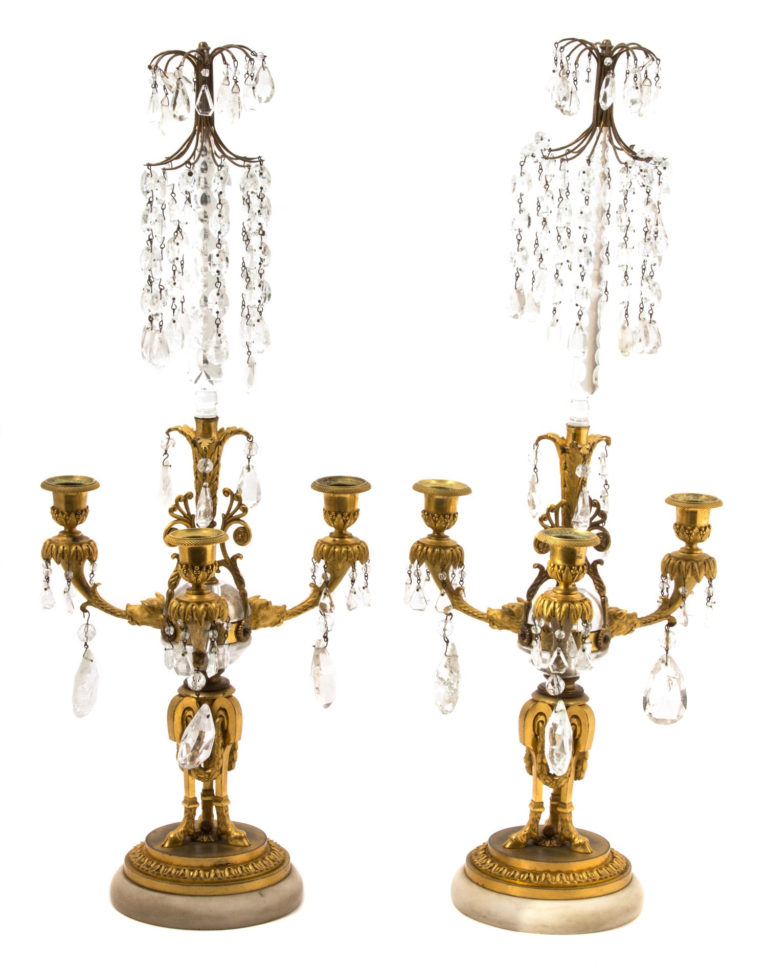A Pair of Louis XVI Style Gilt Bronze and Cut Crystal Three-Light Candelabra Height 23 inches. — 19TH CENTURY