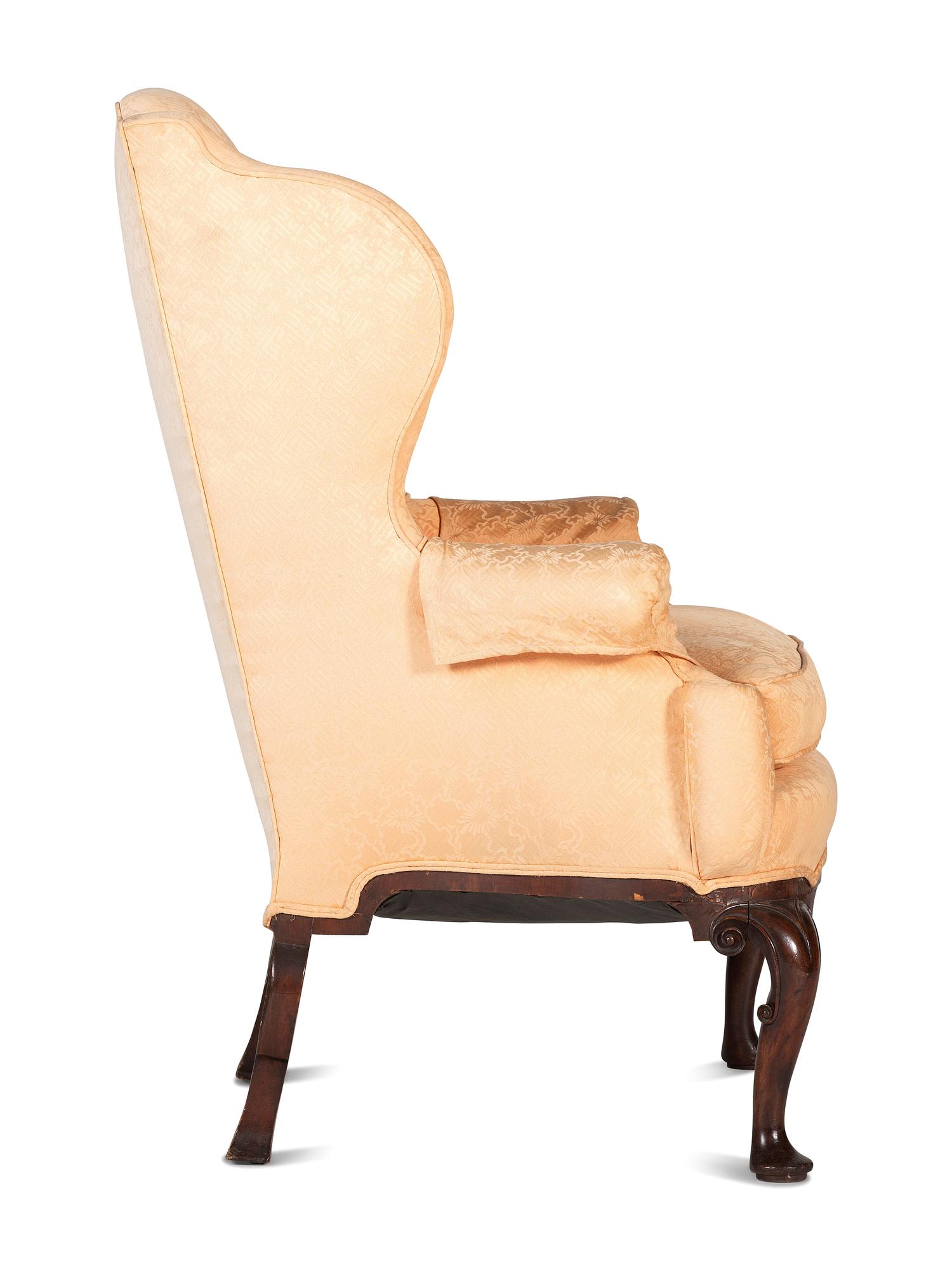 A Queen Anne Style Scroll-Carved Mahogany Easy Chair