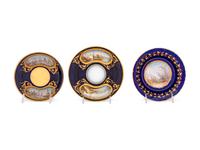 An Assembled Set of Six Sèvres Style Painted and Parcel Gilt Porcelain Teacups and Saucers