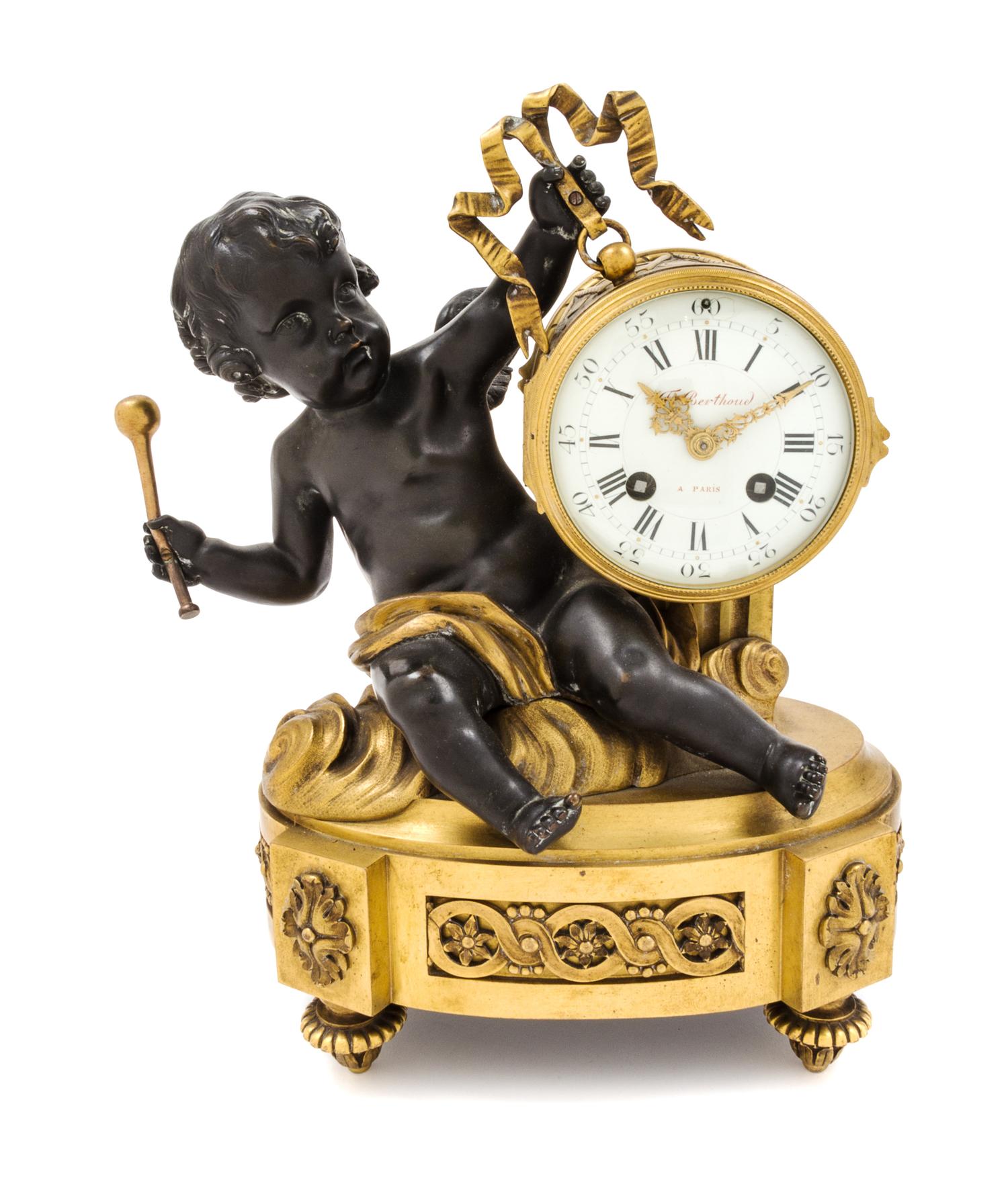 A Louis XVI Style Parcel Gilt Bronze Mantel Clock Height 13 inches. — 19TH CENTURY, AFTER THE 18TH CENTURY MODEL