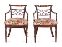 A Pair of George III Carved Mahogany Armchairs
