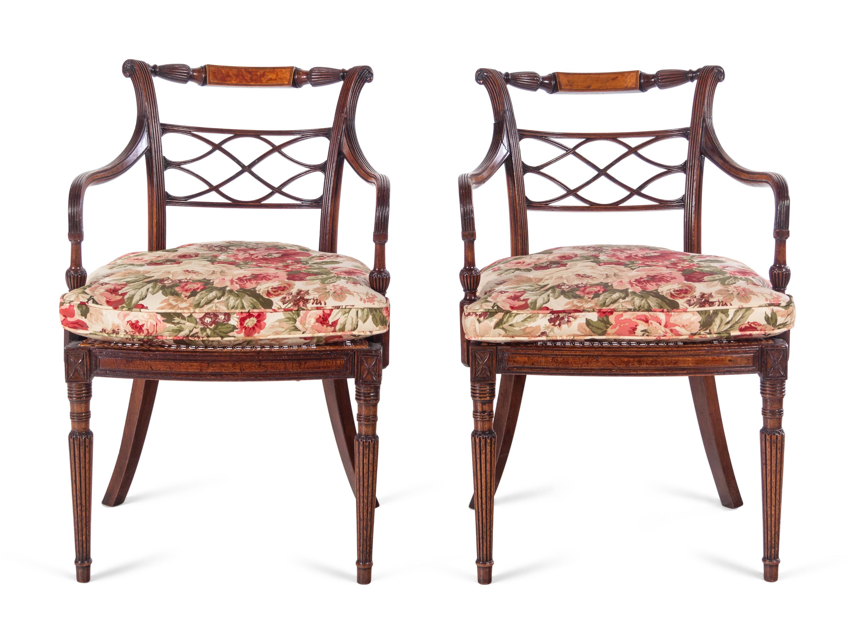 A Pair of George III Carved Mahogany Armchairs