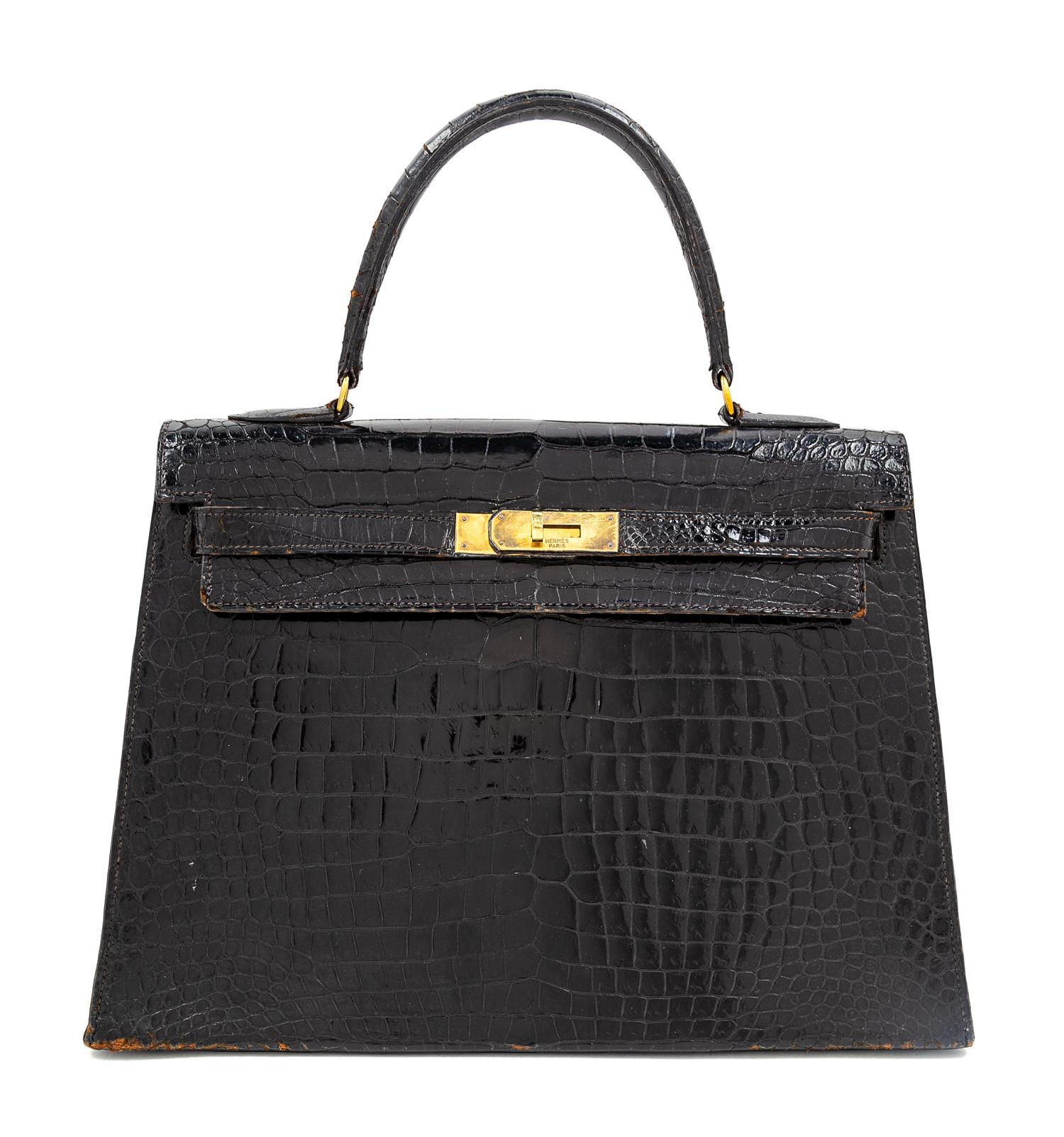 An Hermès Vintage Black Crocodile Kelly Bag, 9" L x 13" W x 4.5" D; Handle drop: 4.5".