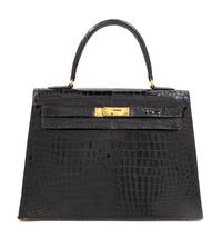 An Hermès Vintage Black Crocodile Kelly Bag, 9" L x 13" W x 4.5" D; Handle drop: 4.5".