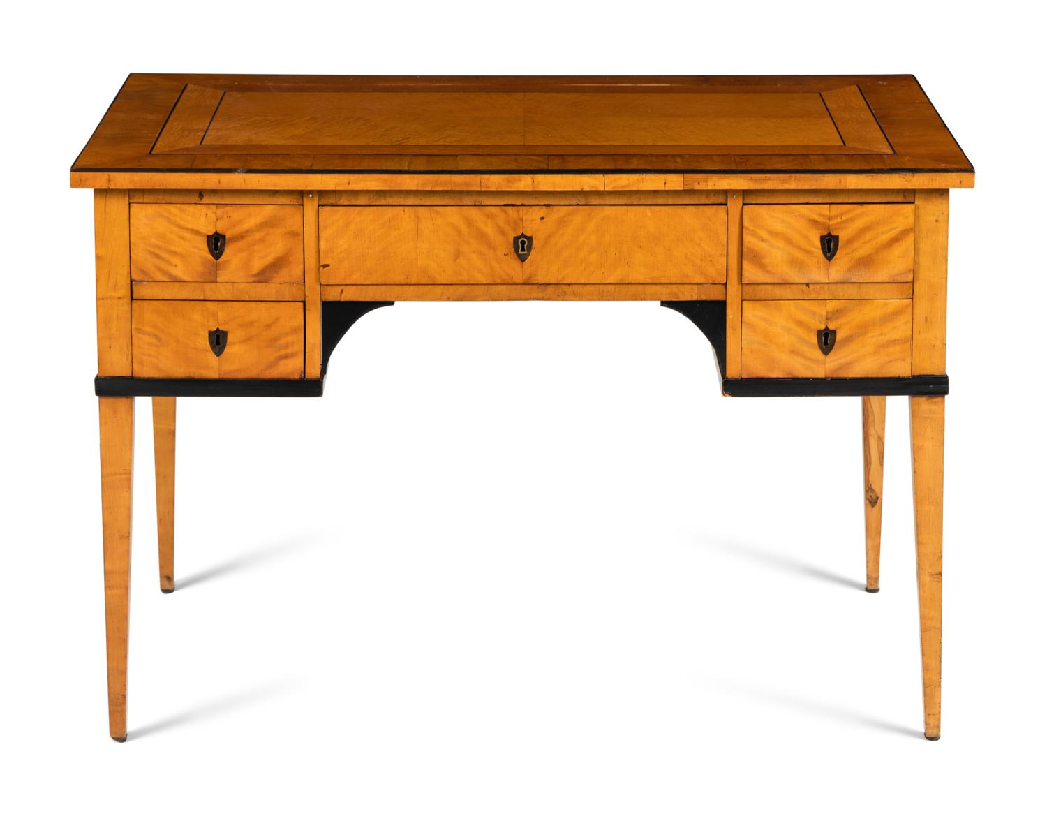 A Biedermeier Maple Desk