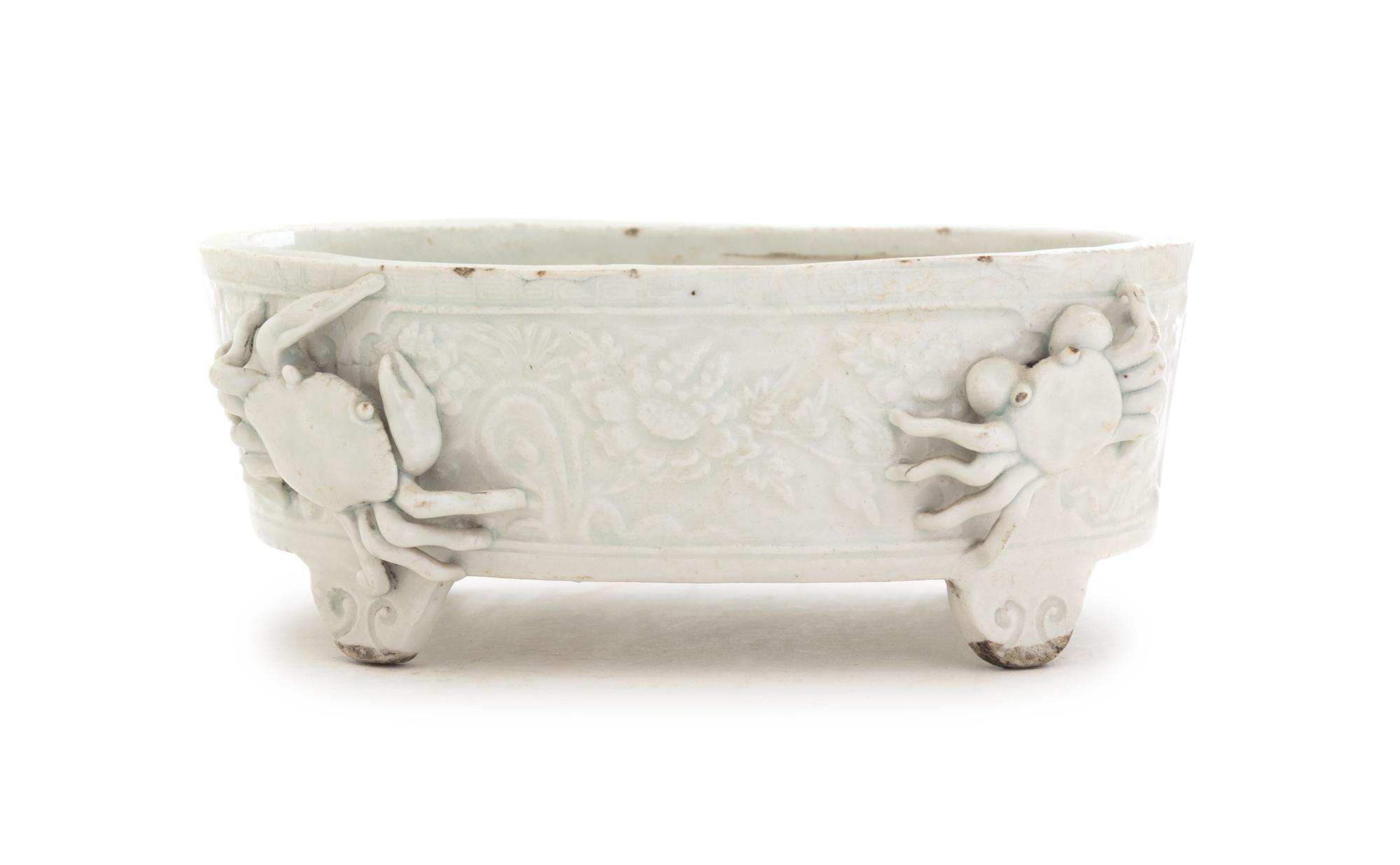A Pale Celadon Glazed Porcelain Cachepot Length 6 3/4 inches.