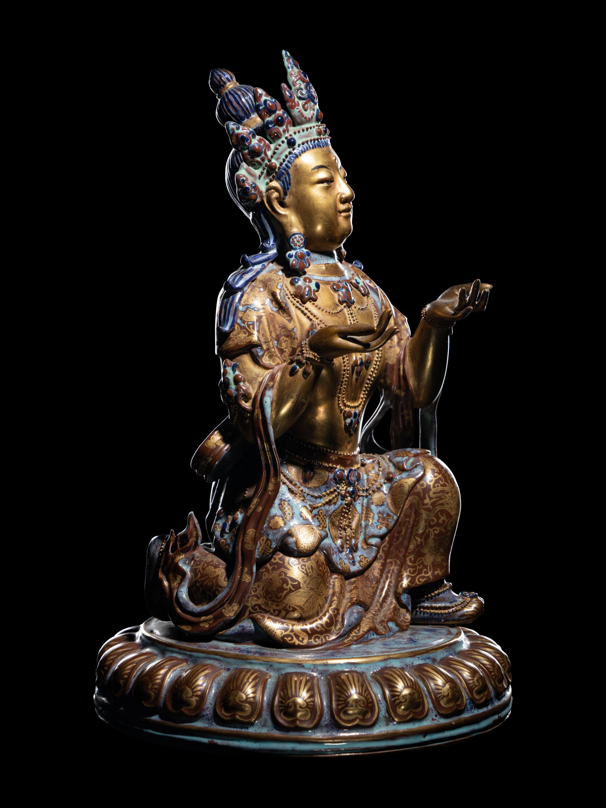 A Gilt Decorated Robin's Egg Glazed Porcelain Figure of Guanyin