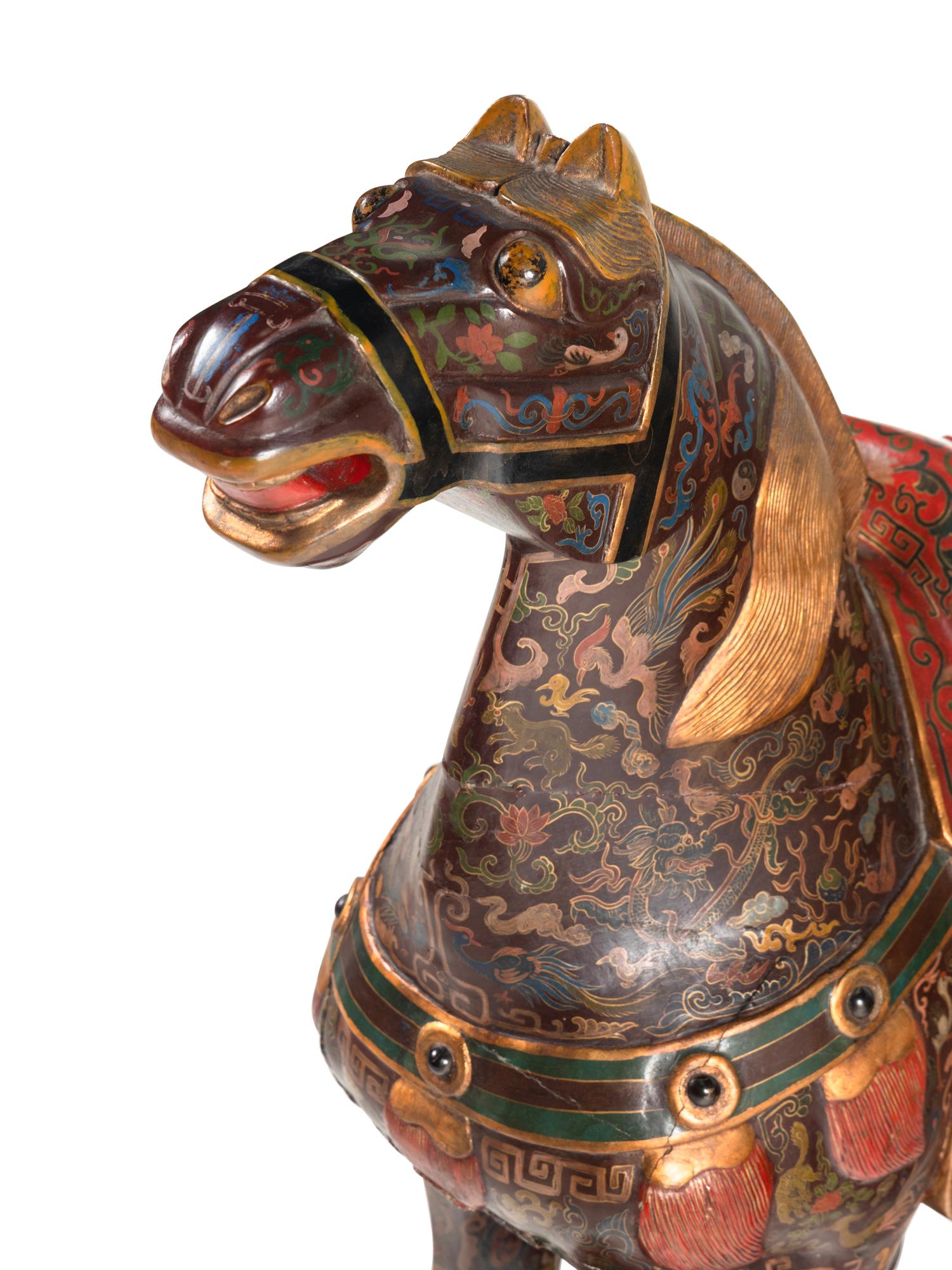 A Pair of Chinese Painted and Parcel Gilt Horses