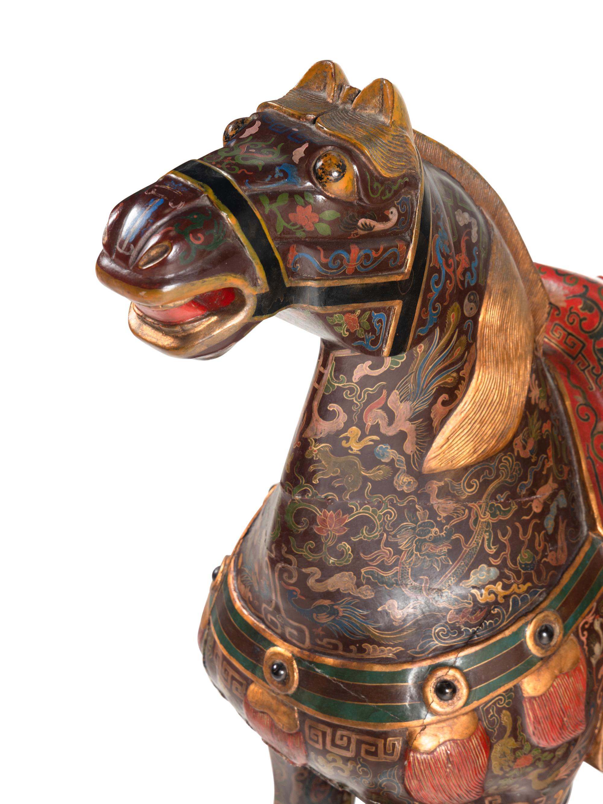 A Pair of Chinese Painted and Parcel Gilt Horses