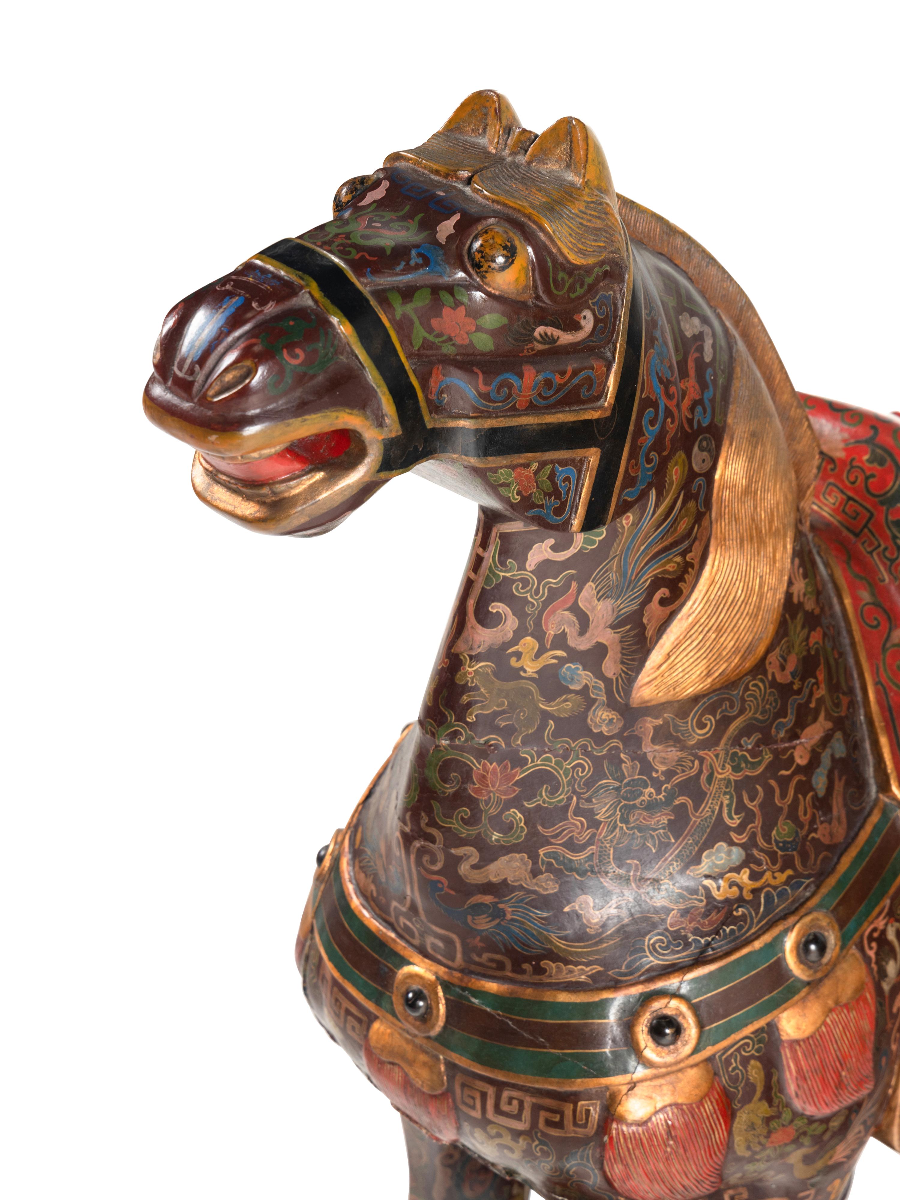 A Pair of Chinese Painted and Parcel Gilt Horses
