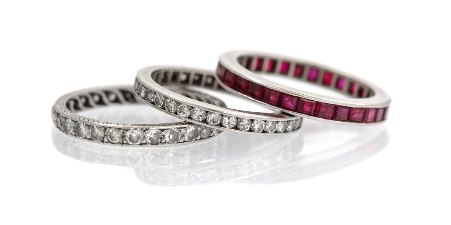 A Collection of Platinum, Diamond and Ruby Eternity Bands, 4.70 dwts.